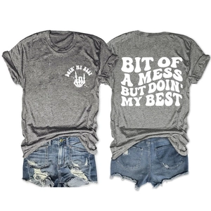 Front and back view of gray short sleeve T-shirt with white graphic print and denim shorts