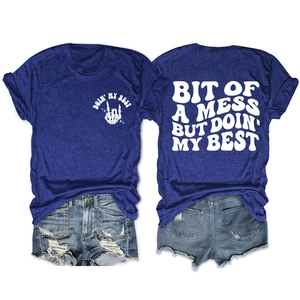 Front and back view of a navy T-shirt with 'Bit of a mess but doin' my best' print