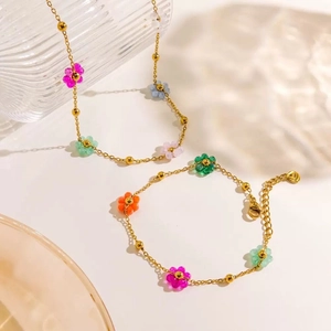 Gold-plated 18K stainless steel necklace featuring colorful handcrafted beaded flowers
