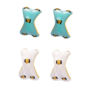 Crossed X earrings set with colorful enamel glaze and golden trim accents