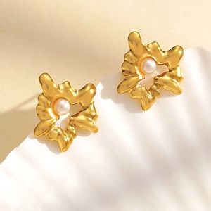 Lava style gold earrings with round white pearls in irregular liquid metal organic design