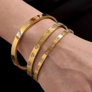 Minimalist gold-plated stainless steel geometric bangles set with sparkling zircon stones