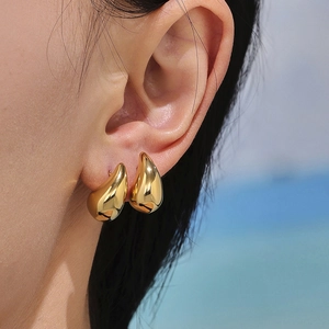 Chic polished hollow teardrop stud earrings in gold finish for a minimalist look