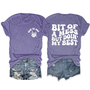 Detail view of the front and back of the purple short sleeve t-shirt with slogan prints