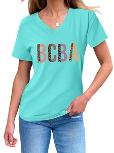 Detail of V-neck short sleeve T-shirt with leopard print BCBA lettering on light blue fabric