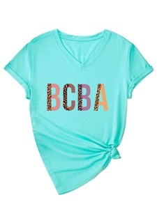 Detail of mint green V-neck T-shirt with leopard BCBA print and front knot hem detail