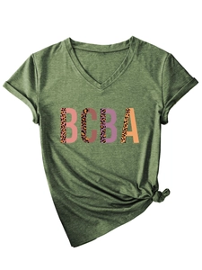 Detail of army green V-neck T-shirt showing BCBA leopard print letters and side knot