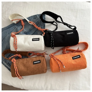 Corduroy cylinder crossbody bags in four colors with fashion labels and rope straps
