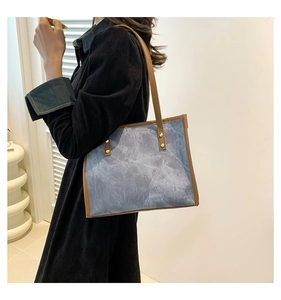 Retro marble pattern tote bag with brown leather handles and gold rivet accents