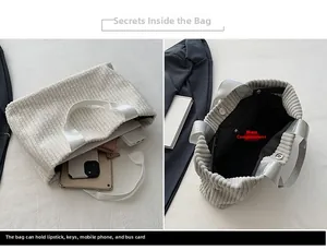 Detail of corduroy tote interior showing magnetic closure and large capacity