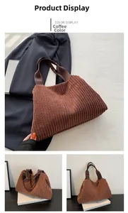 Detailed close-up of brown corduroy tote bag showing ribbed texture and wide shoulder strap