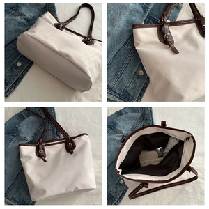 Detailed views of beige canvas bucket bag with brown leather trim and metal buckle accents