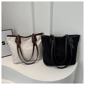 Minimalist large capacity tote bag with leather straps in black and beige colors