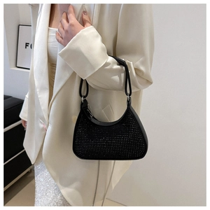 Detailed view of elegant black rhinestone hobo bag with sparkling crystals and chain strap