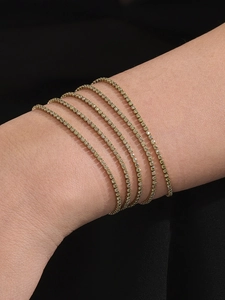 Lot de cinq bracelets de tennis plaqués or 18 carats avec pierres en zircone jaune éclatant