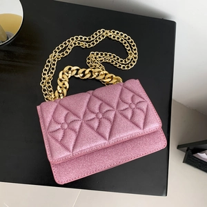 Chic pearlescent pink quilted crossbody bag with golden chain and floral accents