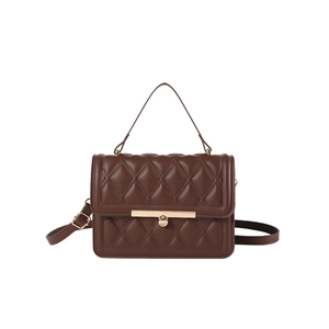 Classic dark brown quilted crossbody bag with gold metal clasp and top handle