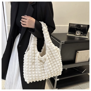 White bubble texture nylon tote bag with cloud silhouette and popcorn quilted finish