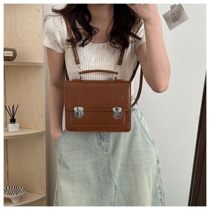 British retro brown satchel bag with double metal buckles and adjustable strap