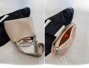 Internal view of beige faux leather tote showing spacious capacity for daily essentials