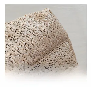 Macro shot of high-density woven straw texture and premium hand-stitched detailing