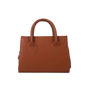 Classic brown PU leather handbag with dual handles and trapezoid minimalist structure