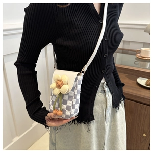 Floral checkered crossbody phone bag with 3D flower detail and woven pattern design