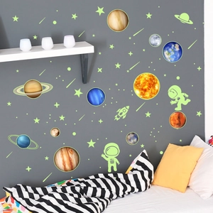 Luminous solar system wall stickers with astronaut and planet decals for kids room