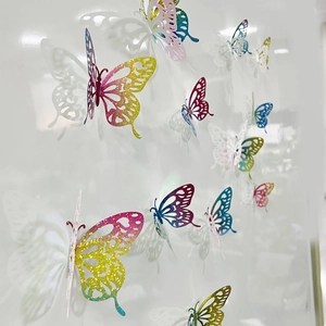 Macro view of detailed 3D hollow colorful gradient butterflies for wall decoration
