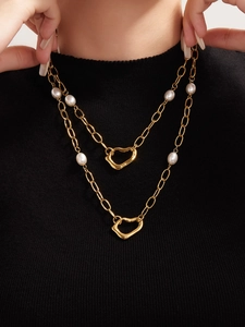 Double layered 18k gold plated necklace with irregular heart pendant and white pearls