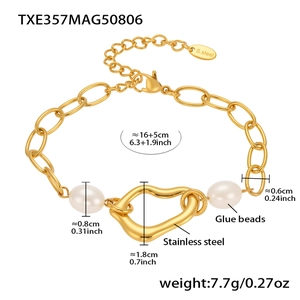 Detail of 18k gold plated stainless steel bracelet with glue beads and irregular heart