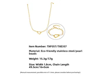 Detail view of 18k gold plated stainless steel jewelry set with irregular faux pearls
