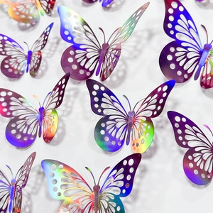Macro shot of 3D laser-cut butterfly wall stickers with iridescent metallic finish