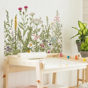 Detail of floral wall stickers with watercolor wildflower design on white wall