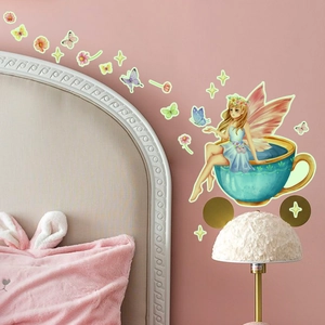 Luminous fairy sitting in a tea cup with glowing stars and butterfly wall stickers