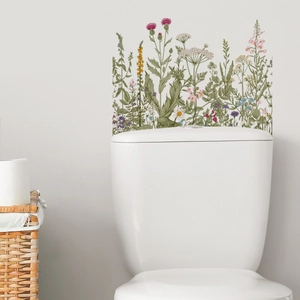 Self-adhesive floral wall stickers with wild daisies and thistles on bathroom walls