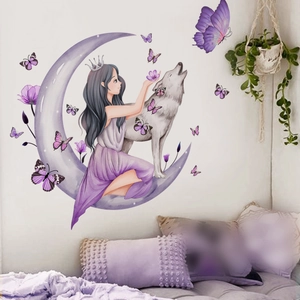 Detail of girl on moon and wolf wall sticker applied to a clean white bedroom wall
