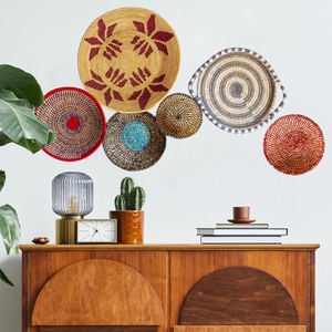 6-piece woven seagrass wall basket set with bohemian geometric patterns and vibrant colors