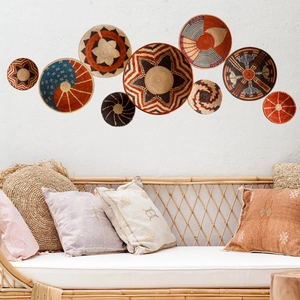 Set of 9 bohemian handwoven seagrass wall baskets with earthy geometric patterns