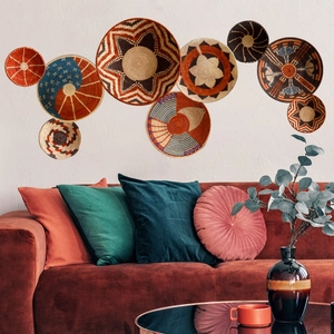 Detailed view of bohemian woven wall baskets in vibrant geometric patterns for home decor