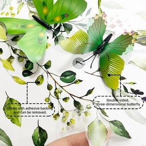 Detail of 3D green butterfly wall stickers with double-sided wings and floral patterns