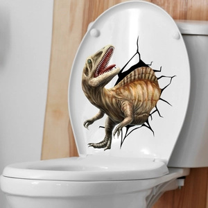 Close-up of 3D cracked wall dinosaur sticker applied on a white toilet lid surface