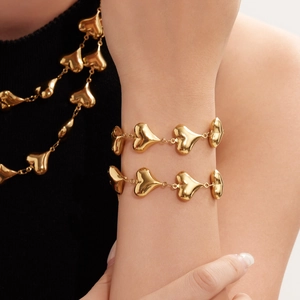 Polished 18k gold plated stainless steel hollow heart necklace and bracelet set