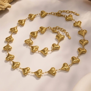 Polished 18k gold plated stainless steel hollow heart necklace and bracelet set