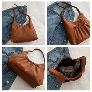Detailed four-view showcase of a large brown shoulder bag with pleated texture and spacious interior