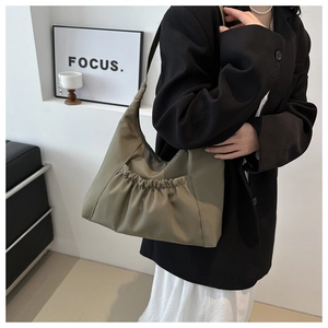 Khaki green pleated shoulder bag for women with stylish front pocket and soft PU material