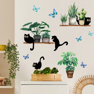 Wandaufkleber mit Cartoon schwarzen Katzen und grünen Topfpflanzen für das Wohnzimmer