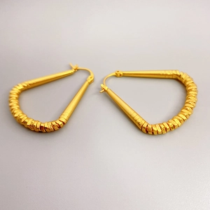 Vintage 18K gold plated brass hoop earrings with textured spiral wire wrap design