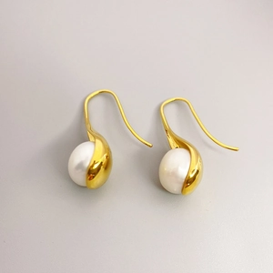 Elegant gold-plated brass ear hooks featuring white cultured pearls and minimalist design