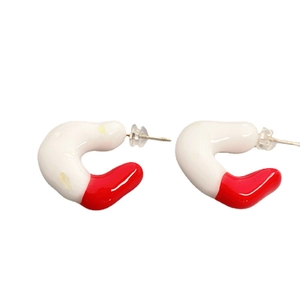 Chic brass C-shape hoop earrings with bold red and white enamel finish and silver pins
